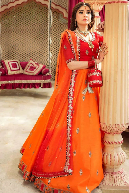 Orange Raw Silk Lehenga Choli with Potli