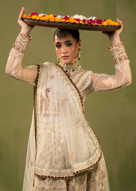 Ivory Embellished Flared Lehenga Choli