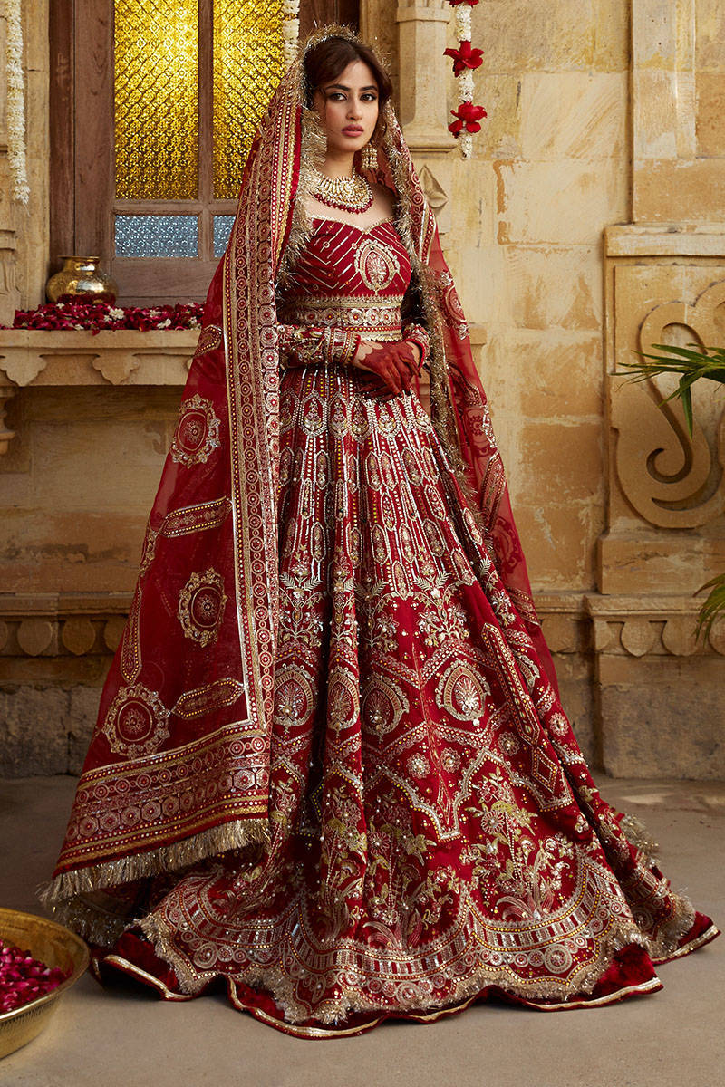 NITIKA GUJRAL' presents Gold Tissue Lehenga Choli And Belt With Cotrasting  Red Tulle Dupatta And Optional Gold Tissue Second Dupatta available  exclusively at FEI