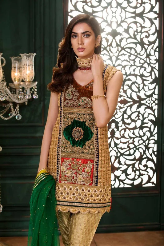 gold velvet suit with colorful dupatta in dubai